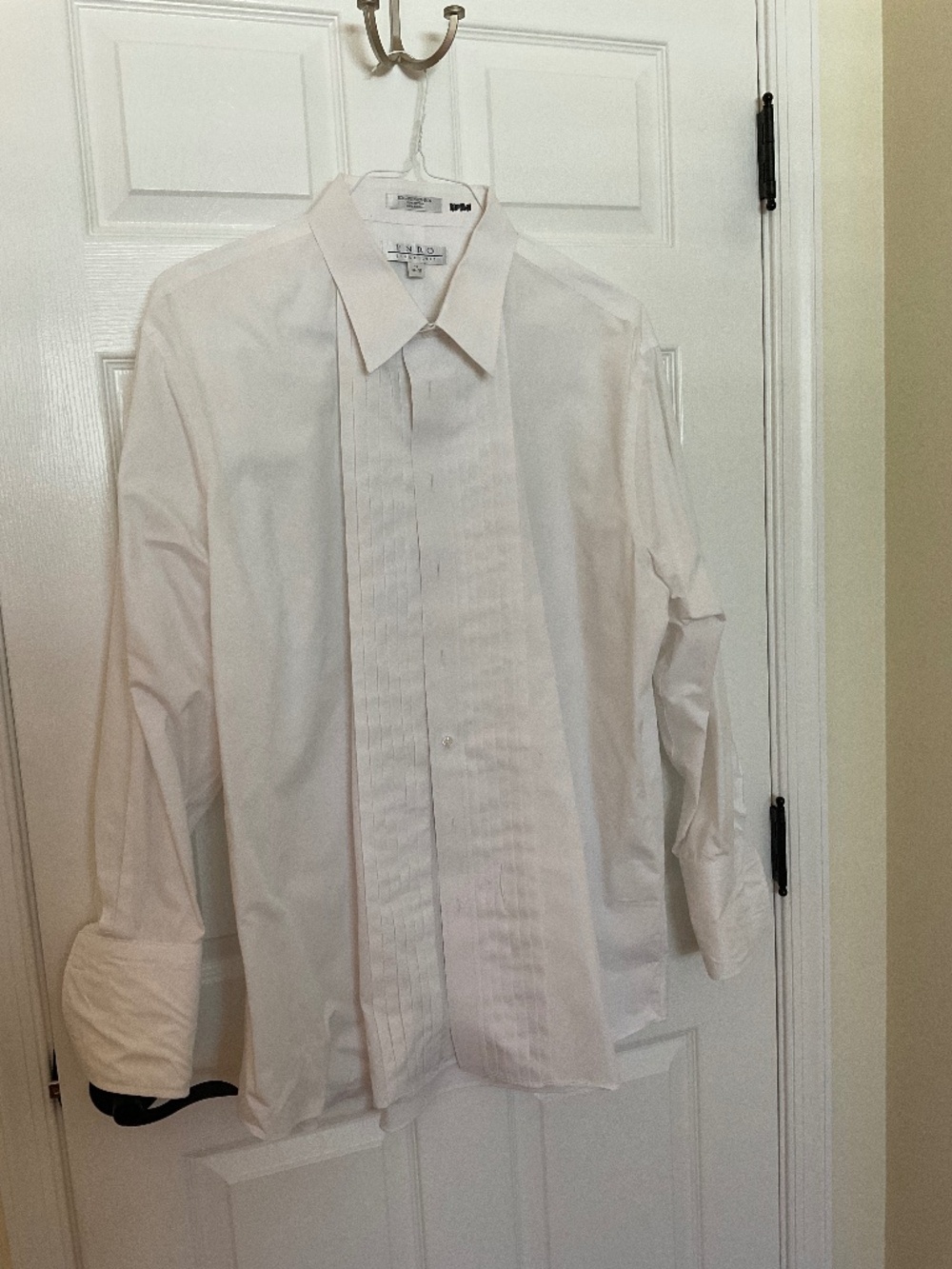 Men’s white tuxedo shirt.  V Good condition!  Worn once!  Size 19 35/35 sleeve.